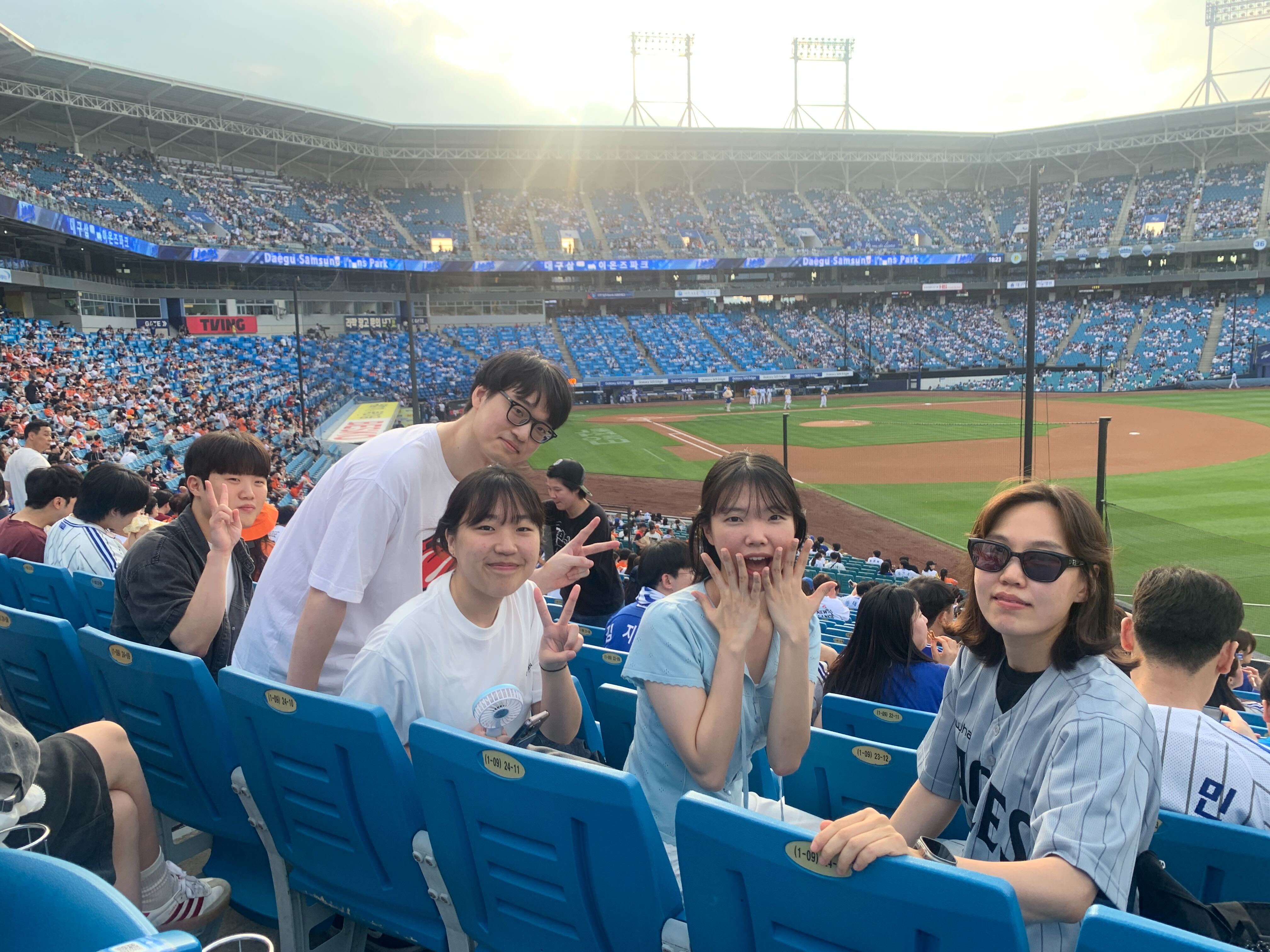 NGWS members at a baseball game